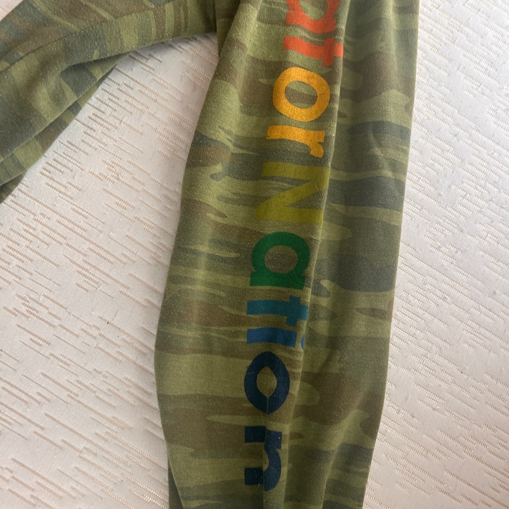 Green camo aviator nation sweatpants with rainbow logo on side
